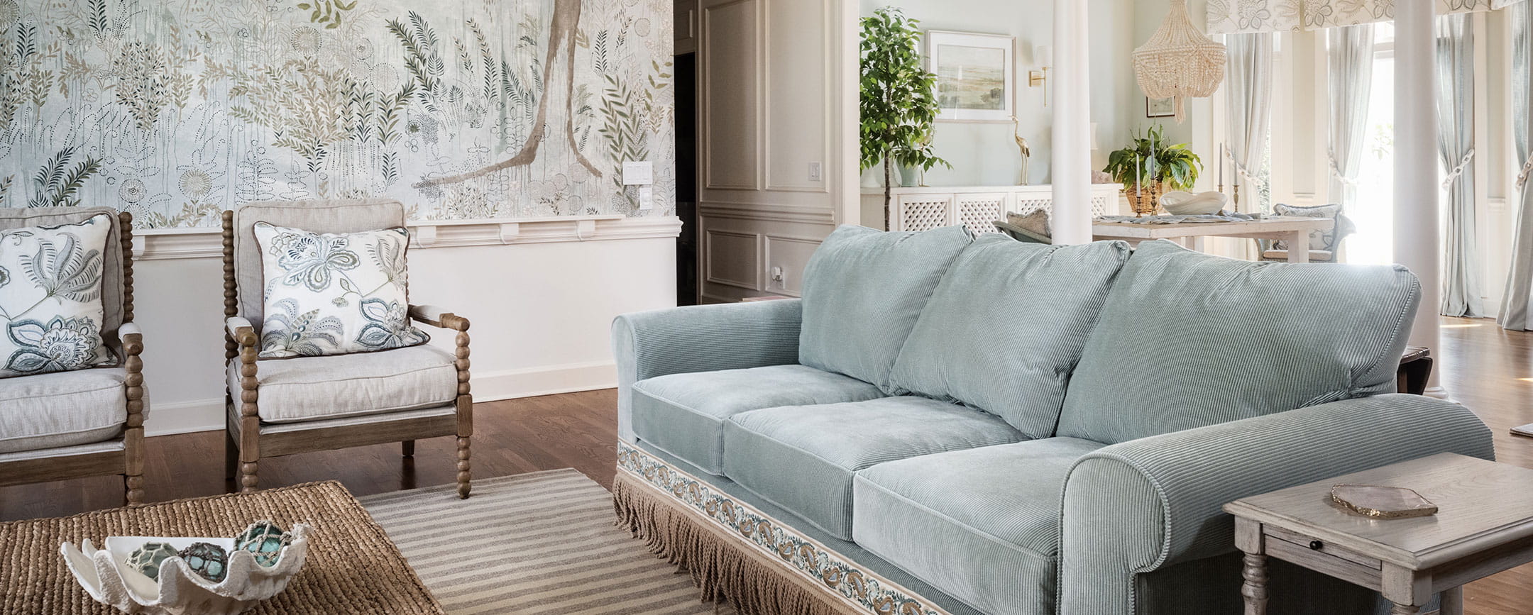 Living room decor in soft neutrals, blues and wood tones